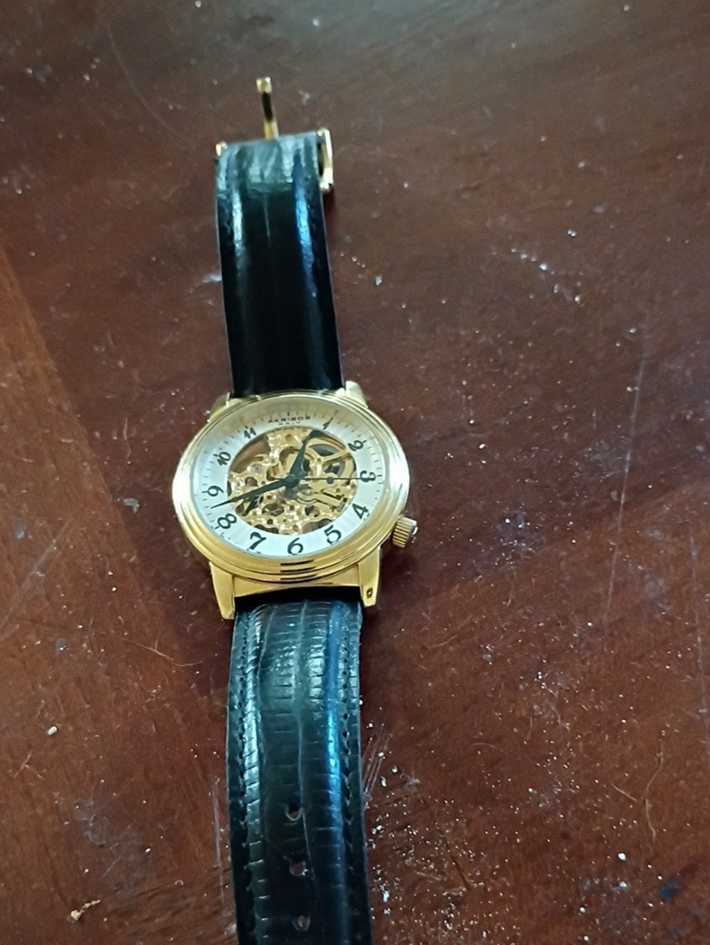 Gold Skeleton Dial Men's Watch with Black Leather Strap